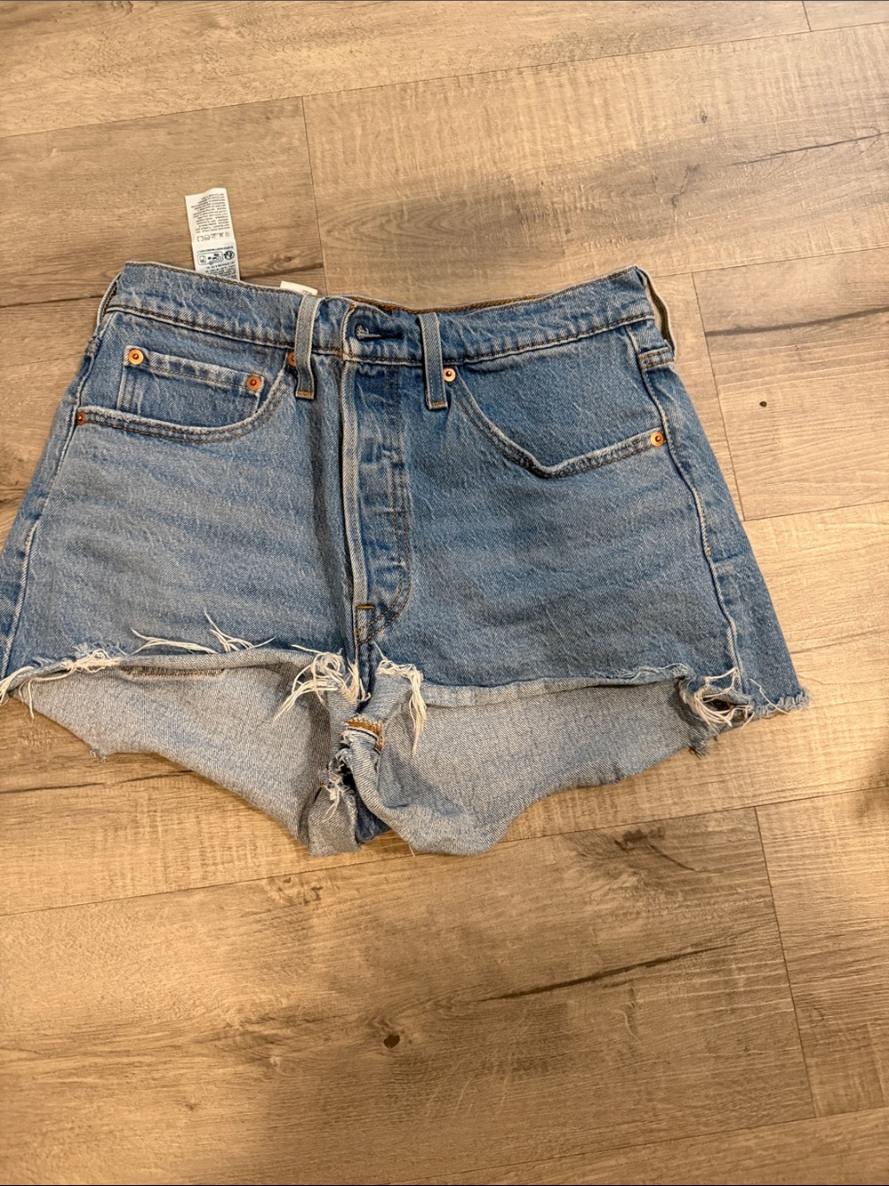 Levi's Light Blue Frayed Denim Cutoff Shorts